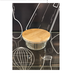 Small round transparent glass refrigerator container with lid 
