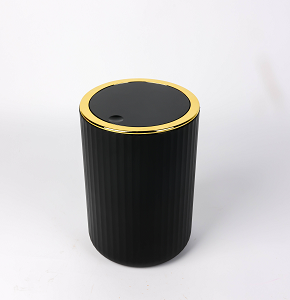 Black cylindrical trash bin for paper waste
