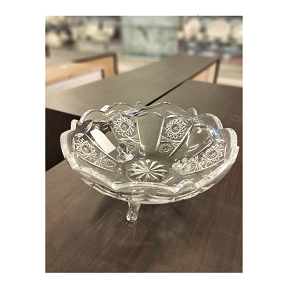 Living Home glass fruit plate, featuring a classic ornate design with shiny crystal engravings, resting on three elegant legs that provide exceptional stability and elegance
