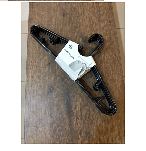 Set of practical black plastic clothes hangers
