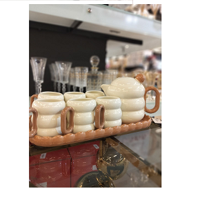 Luxury serving set with a lid and a square tray with a matching design
