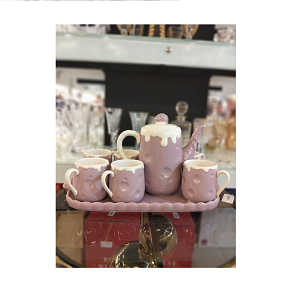 Modern porcelain tea set, consisting of one teapot, six cups, and one tray
