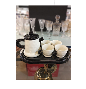 Full porcelain tea set, consisting of one teapot, four cups, and one tray
