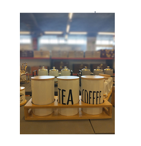 Set of 3-piece porcelain sugar jars for storing tea coffee and sugar with wooden lids and elegant wooden base modern and simple design 
