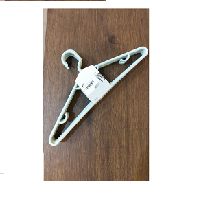 Set of light green plastic clothes hangers made of durable plastic slim space-saving design
