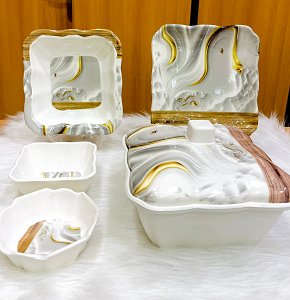 Melamine dinner set, 38 pieces, combining luxurious marble patterns with natural wood lines.
