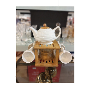 Porcelain tea set consisting of teapot plus 6 white ceramic cups with 6 wooden coasters and versatile wooden holder 
