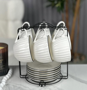 Tea set of 6 cups with saucers and a metal stand
