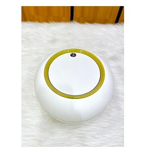 Small luxurious pumpkin-inspired trash bin with spherical white plastic decorated with ribbed lines and push-to-open lid equipped with barely visible small legs 
