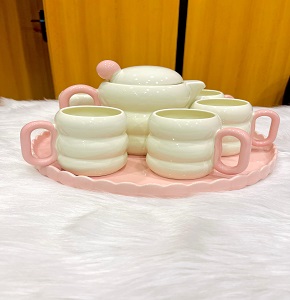 Porcelain tea set designed with a marshmallow pattern, consisting of one large teapot + 6 cups + one tray
