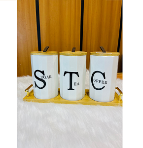 Set of 3-piece porcelain sugar jars for storing tea coffee and sugar equipped with wooden lids with leather handles and design with embossed English letters on elegant wooden base 
