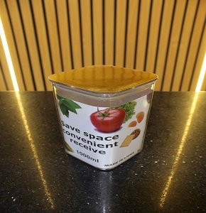 A box of legumes with a round + square gold lid
