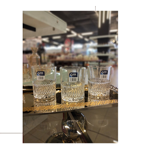 Living Home 6-piece glass cup set with elegant cylindrical design and base decorated with prominent spiral lines 

