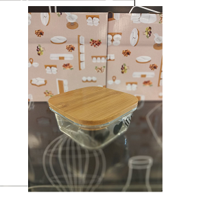 Medium square glass refrigerator container with heart-decorated lid 
