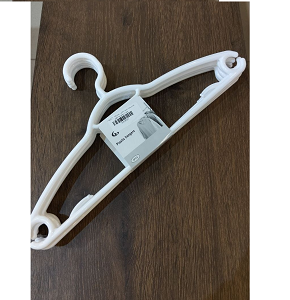 Set of white plastic clothes hangers designed for heavy garments 

