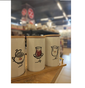 Set of 3-piece porcelain sugar jars with elegant oriental design for storing tea and sugar equipped with wooden lids and practical wooden base adding aesthetic touch to kitchen or hospitality corner 
