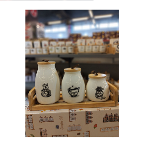Set of 3-piece porcelain sugar jars for storing tea sugar and coffee with tight wooden lids and practical wooden base with modern artistic patterns adding beauty to your kitchen 
