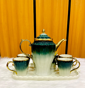A luxury tea set consisting of one teapot, six cups, and one serving tray.
