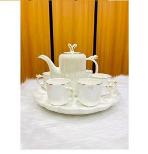 Luxury porcelain tea set with an elegant design, consisting of one teapot and 6 cups, and an elegant square tray
