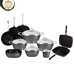 Granite 15-piece round set includes pots (18-20-24-28 cm) a 16 cm milk pot a 31 cm casserole a 32 cm crepe pan a 28 cm wok a 24 cm frying pan and a 36 cm double grill in black.
